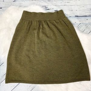 Eileen Fisher green knit a-line shirt.